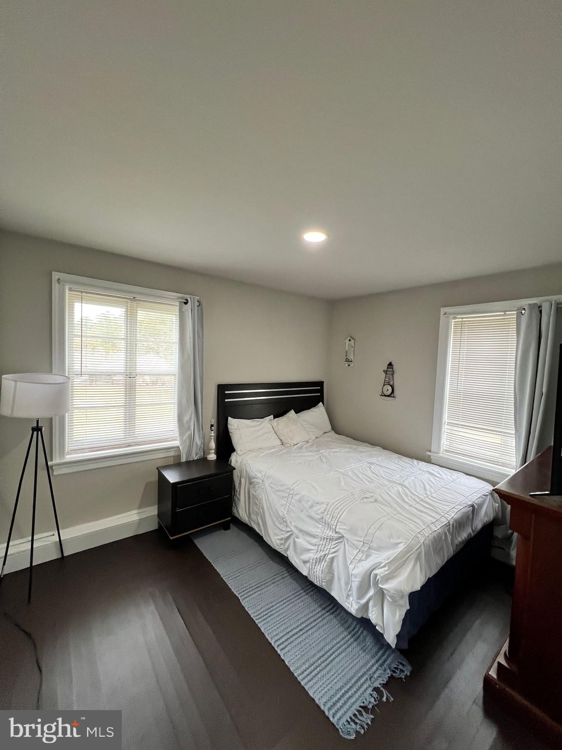 114 Hall Highway Crisfield, MD 21817 - Photo 21 of 30 a bedroom with a bed and a window
