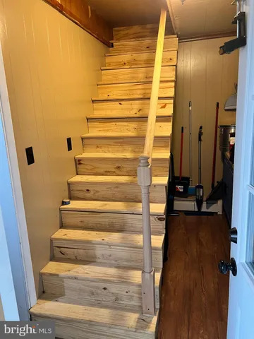 a view of entryway with wooden floor