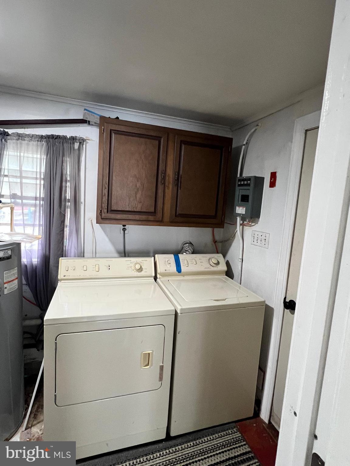 114 Hall Highway Crisfield, MD 21817 - Photo 25 of 30 a utility room with dryer and washer