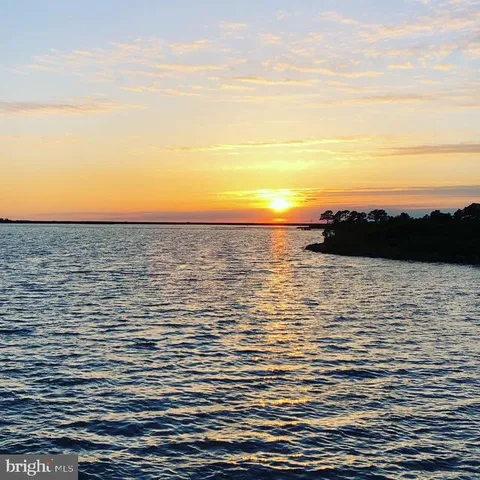 a view of ocean with beach