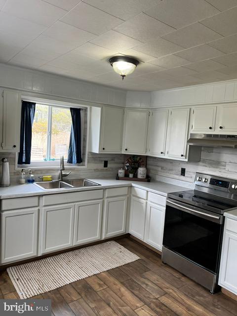 114 Hall Highway Crisfield, MD 21817 - Photo 8 of 30 a kitchen with stainless steel appliances granite countertop a stove and a sink