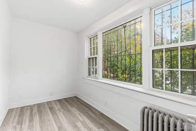 a view of an empty room and window