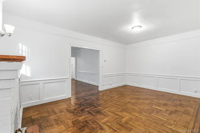 a view of a room with an empty space and empty racks