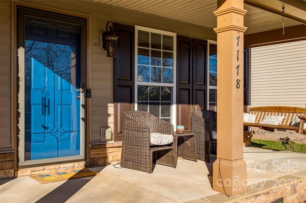 7178 Meyer Road Fort Mill, SC 29715 - Photo 3 of 36 a front view of a house with a patio