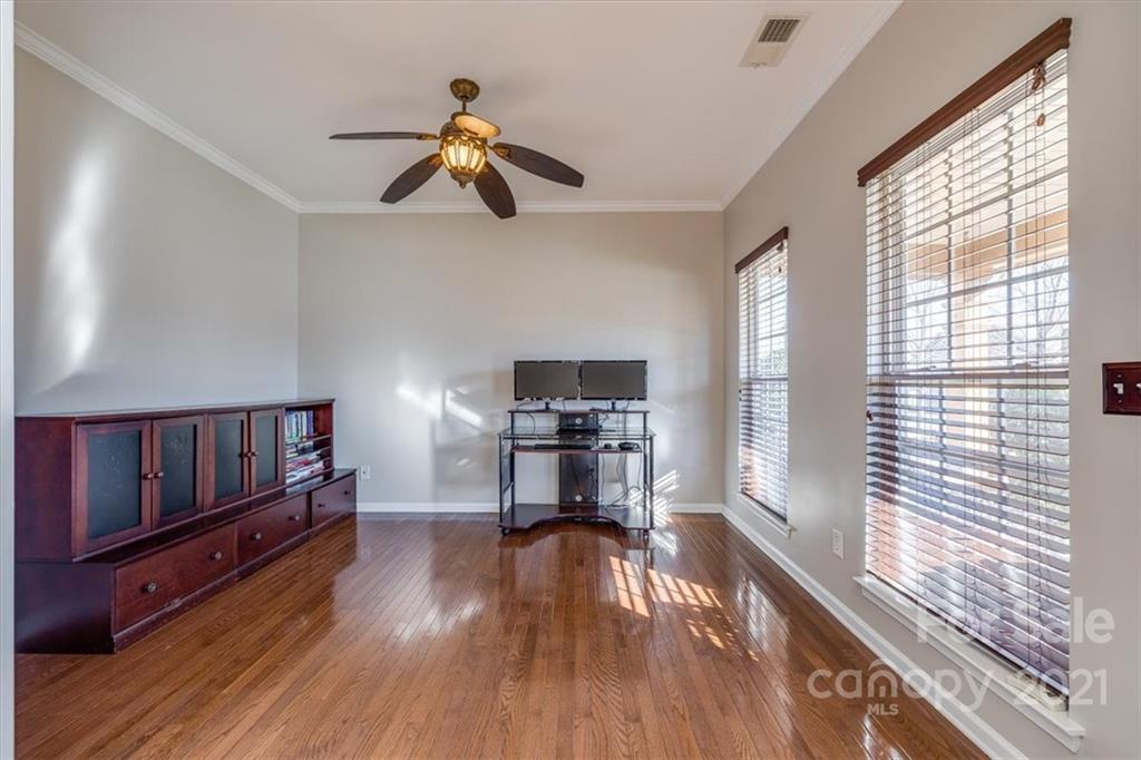 7178 Meyer Road Fort Mill, SC 29715 - Photo 6 of 36 a living room with furniture and a wooden floor