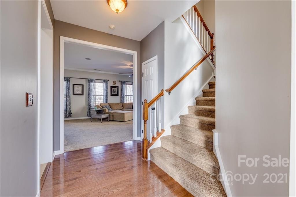 7178 Meyer Road Fort Mill, SC 29715 - Photo 7 of 36 a view of a hallway view with staircase