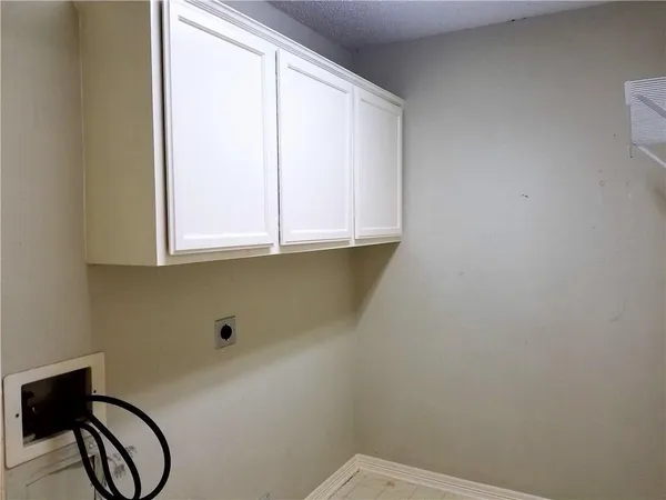 a bathroom with a sink and a window
