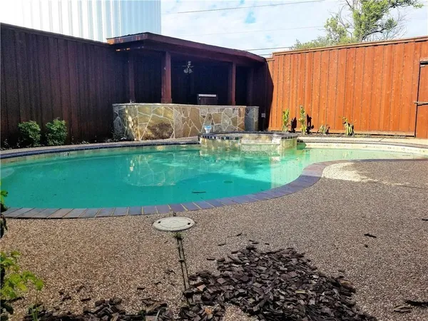 a view of a back yard of the house