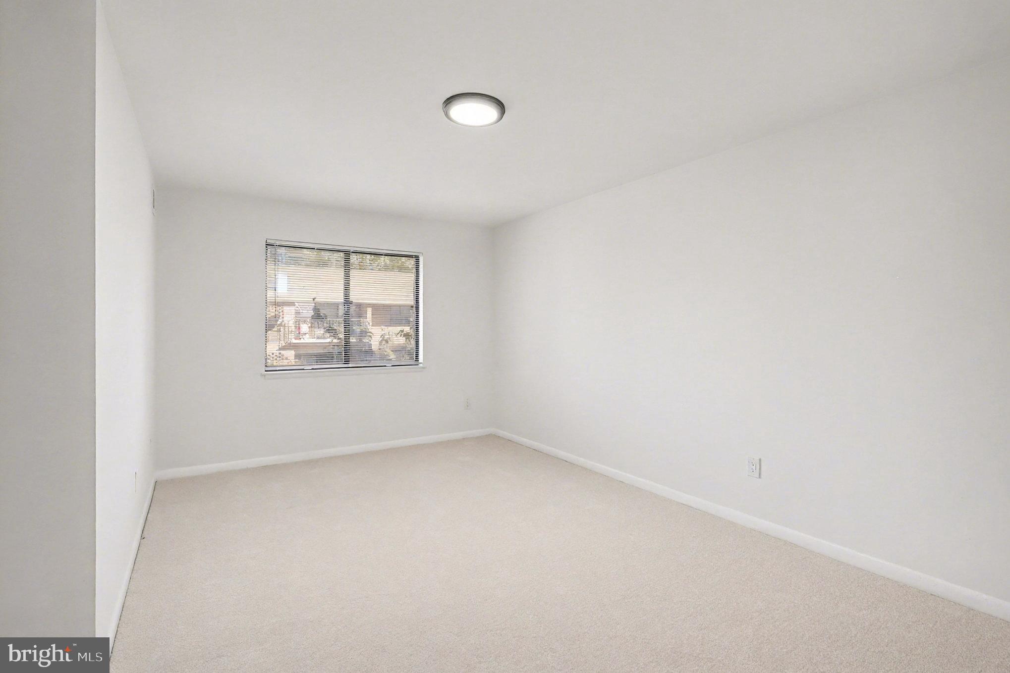 7610 Savannah Street, Unit 201 Falls Church, VA 22043 - Photo 17 of 24 Primary Bedroom