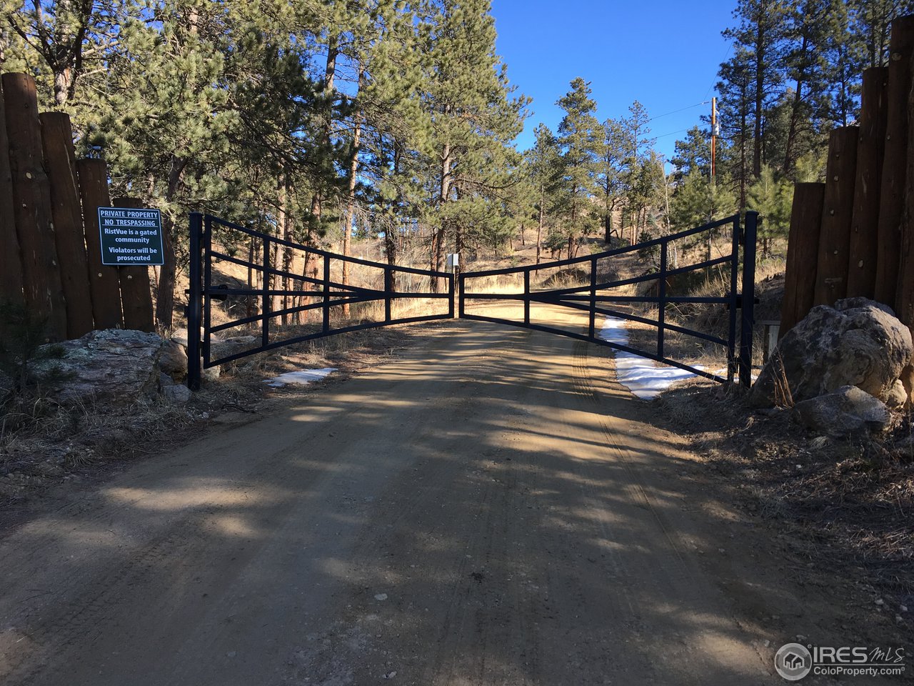 826 Davis Ranch Road Bellvue, CO 80512 - Photo 19 of 26 a view of street with trees