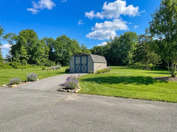 a house view with a garden space