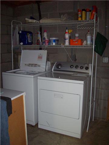 2889 She Boss Road Duck River, TN 38454 - Photo 14 of 20 Utility room in basement, kit. pantry has hook ups in place for utility room.