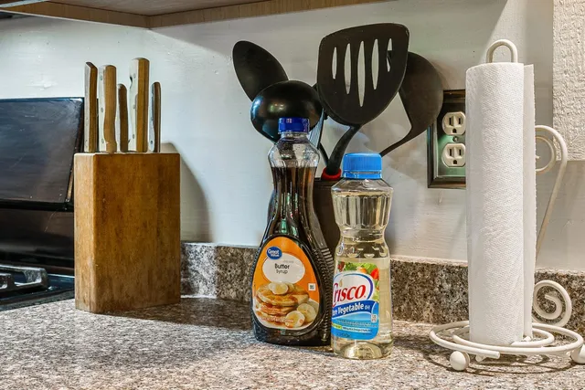 a bedroom with a bed and flat screen tv