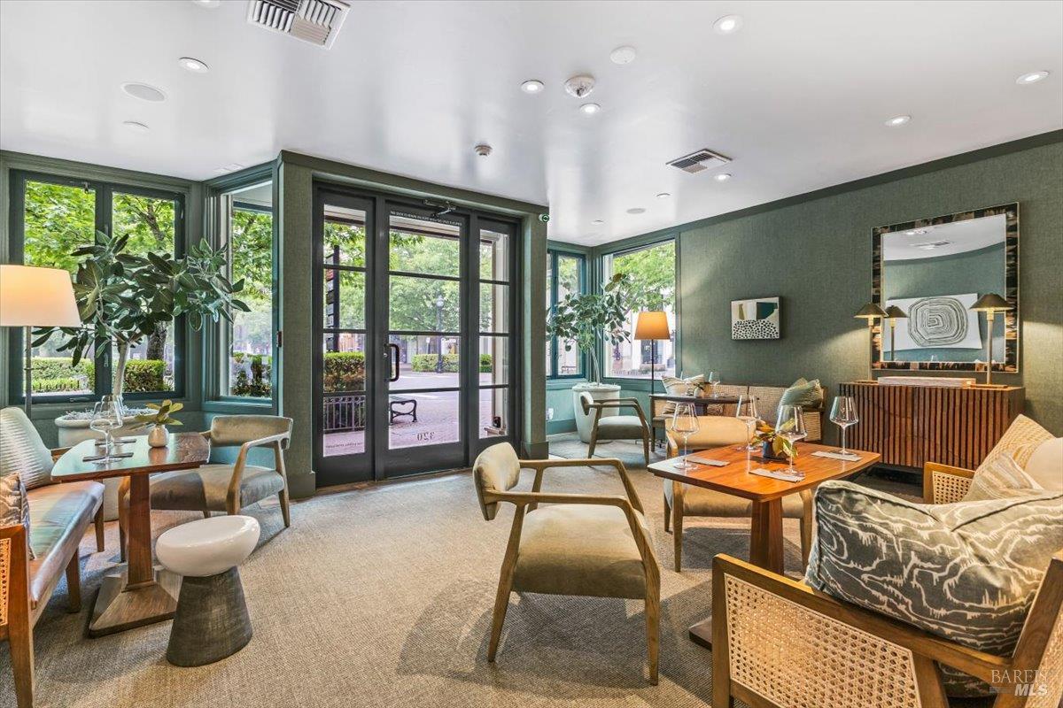 320 Center Street Healdsburg, CA 95448 - Photo 11 of 56 a living room with furniture and a floor to ceiling window