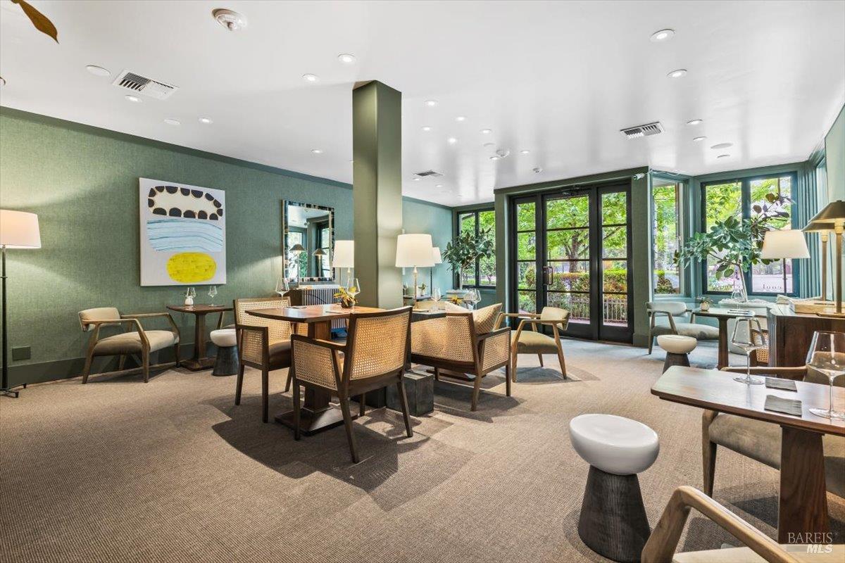 320 Center Street Healdsburg, CA 95448 - Photo 12 of 56 a view of a dining room with furniture water and a chandelier