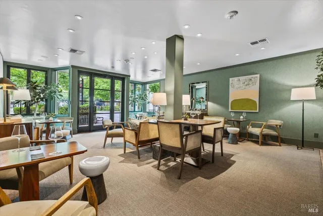 a kitchen with stainless steel appliances granite countertop a sink and a wooden cabinets