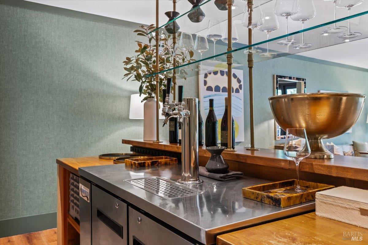 320 Center Street Healdsburg, CA 95448 - Photo 15 of 56 a kitchen with stainless steel appliances granite countertop a sink and a wooden cabinets