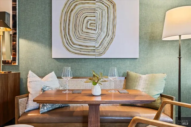 a view of a dining room with furniture window and outside view