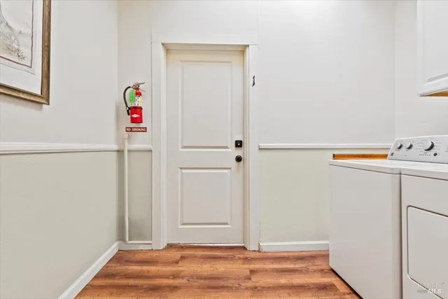 a stove top oven sitting inside of a kitchen