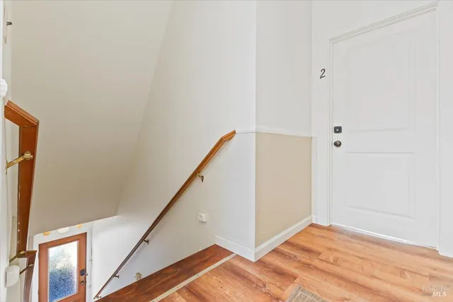 a bed room with a bed and a window