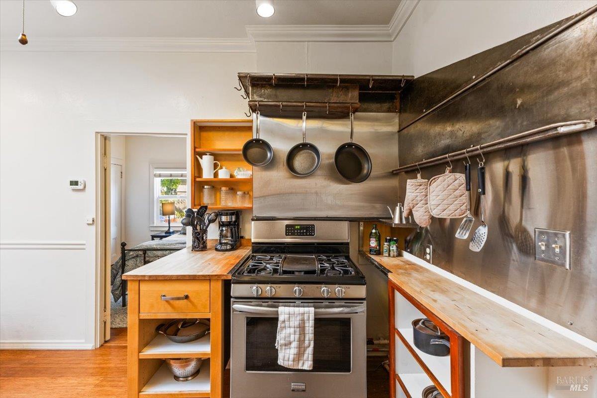 320 Center Street Healdsburg, CA 95448 - Photo 45 of 56 a stove top oven sitting inside of a kitchen