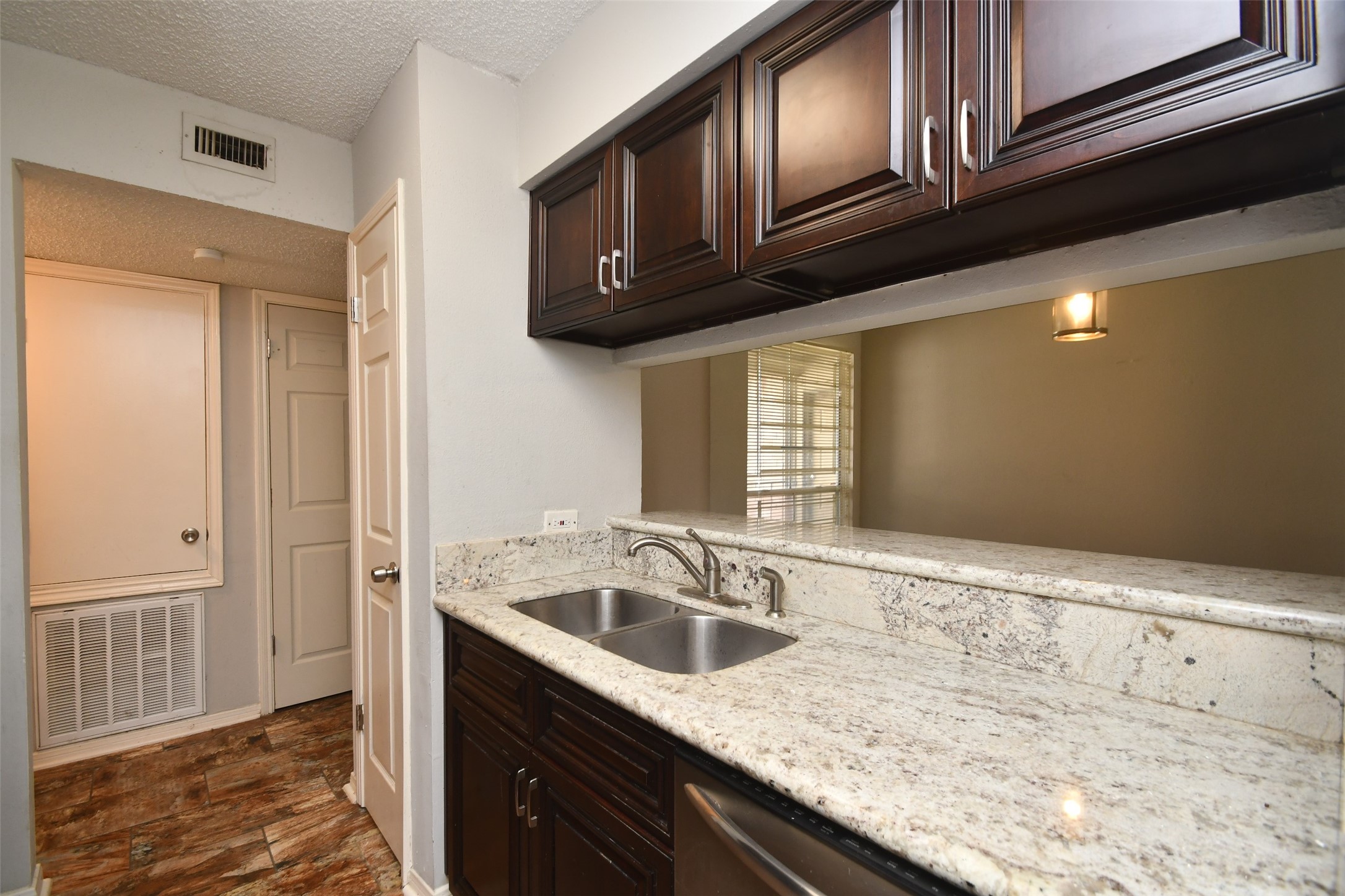 700 Thicket Lane, Unit 704 Houston, TX 77079 - Photo 16 of 44 Granite Countertops and Custom Cabinetry