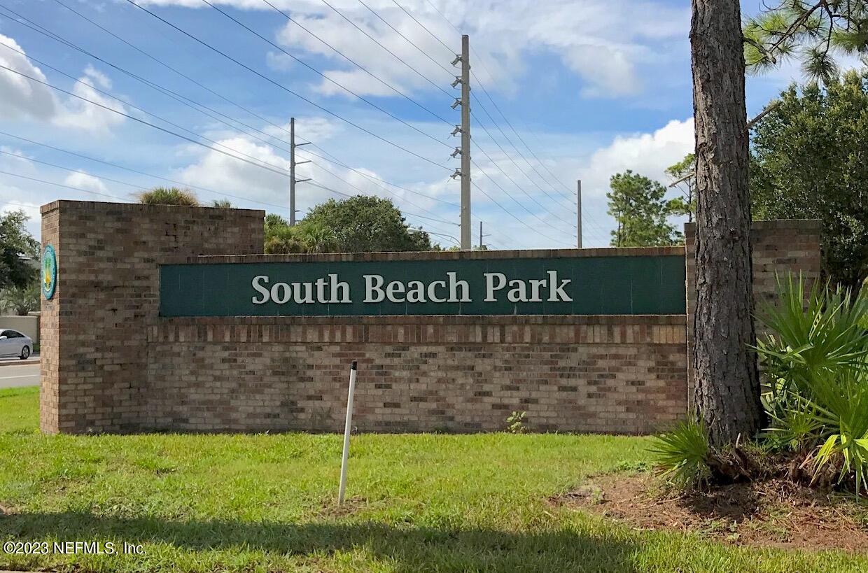 1676 Westwind Drive Jacksonville Beach, FL 32250 - Photo 32 of 42 a view of a street sign on the wall