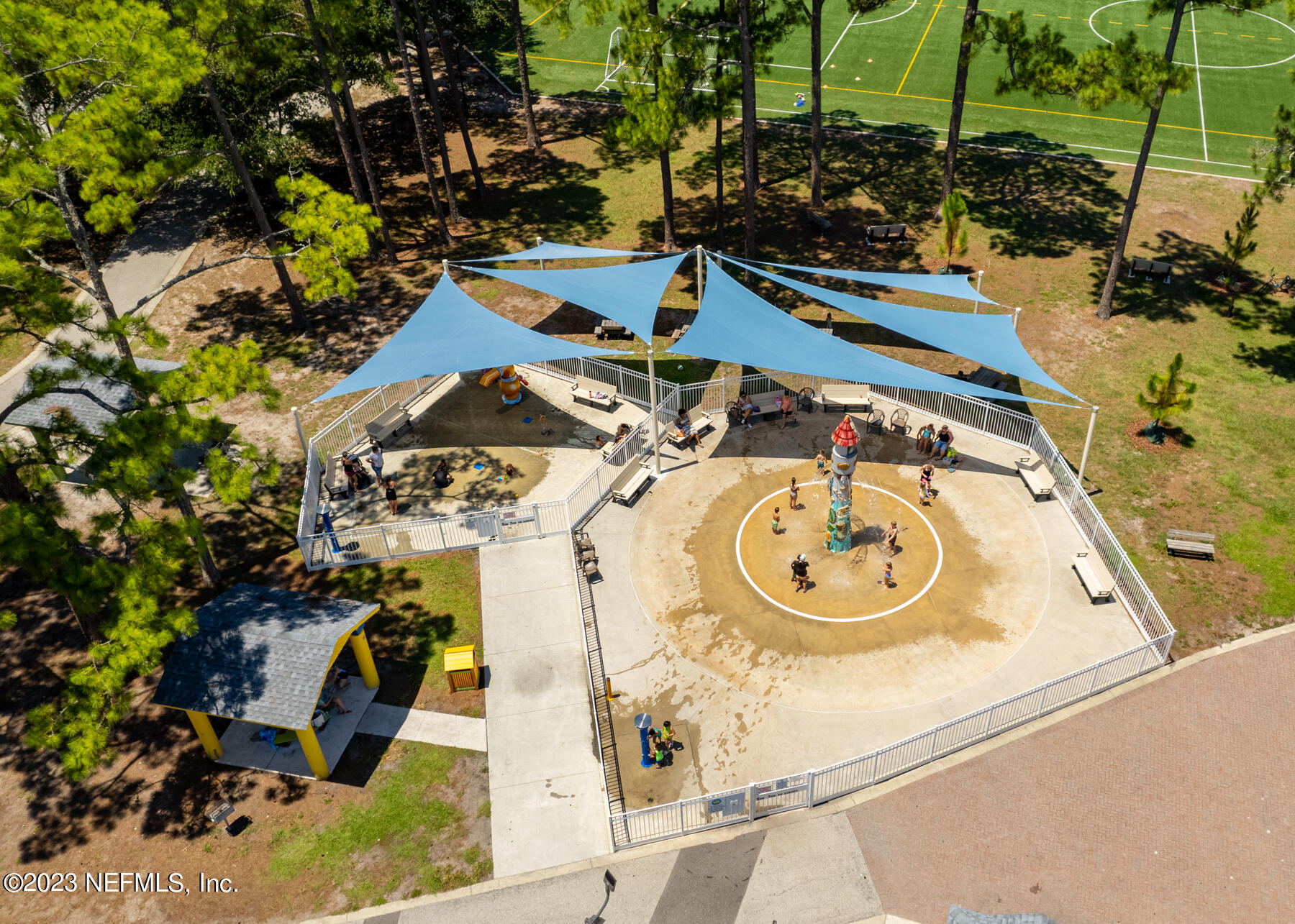 1676 Westwind Drive Jacksonville Beach, FL 32250 - Photo 37 of 42 a view of a house with a swimming pool