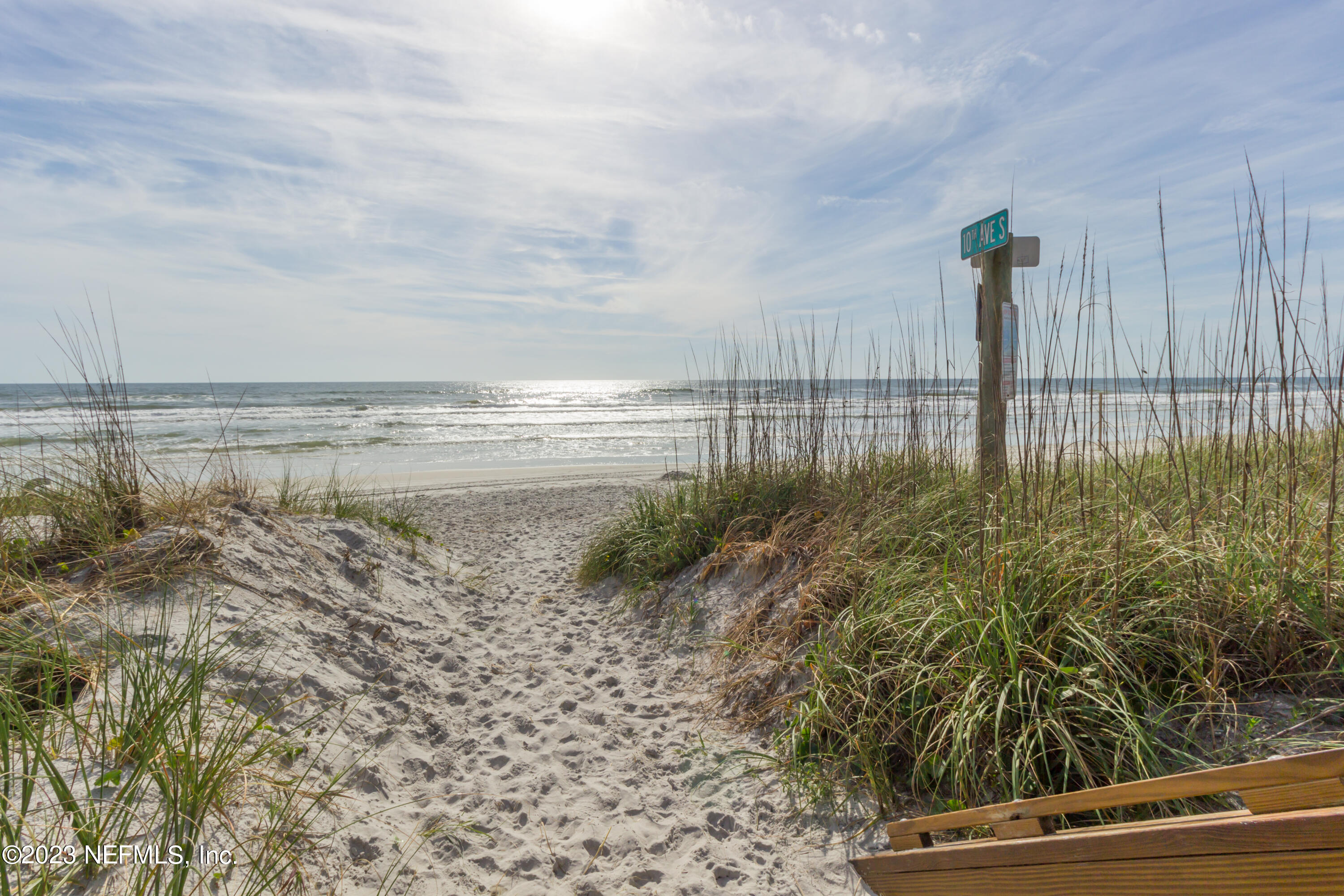 1676 Westwind Drive Jacksonville Beach, FL 32250 - Photo 41 of 42 a view of a terrace with a garden