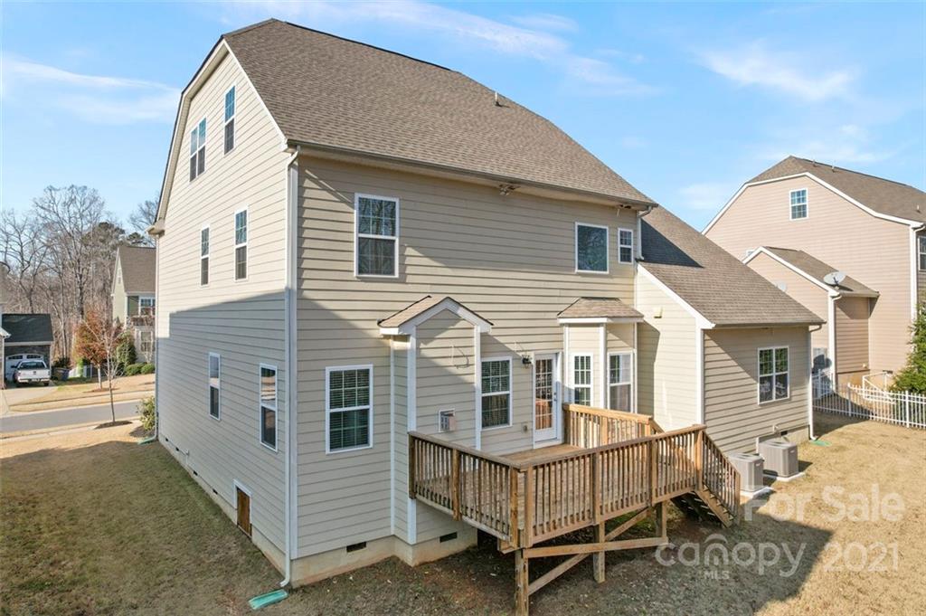 4331 Oxford Mill Road Waxhaw, NC 28173 - Photo 44 of 48 a view of a house with a wooden deck