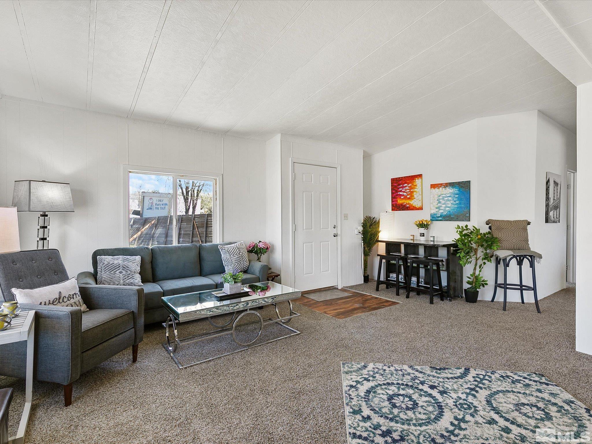 17560 Thrush Lane Reno, NV 89508 - Photo 13 of 27 a living room with furniture and a window
