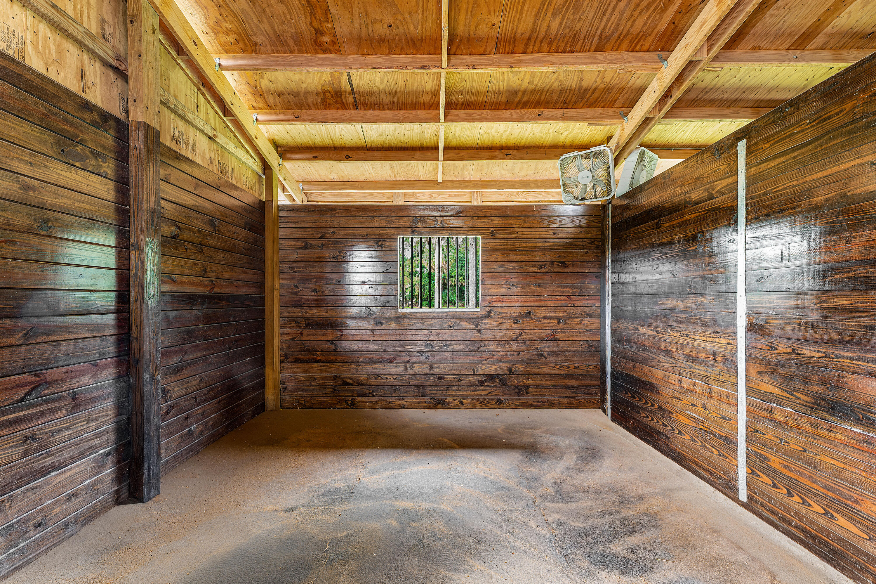 1815 E Road, Unit BARN Loxahatchee Groves, FL 33470 - Photo 3 of 9 a view of storage and utility room