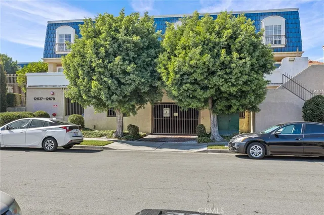 a car parked in front of a house