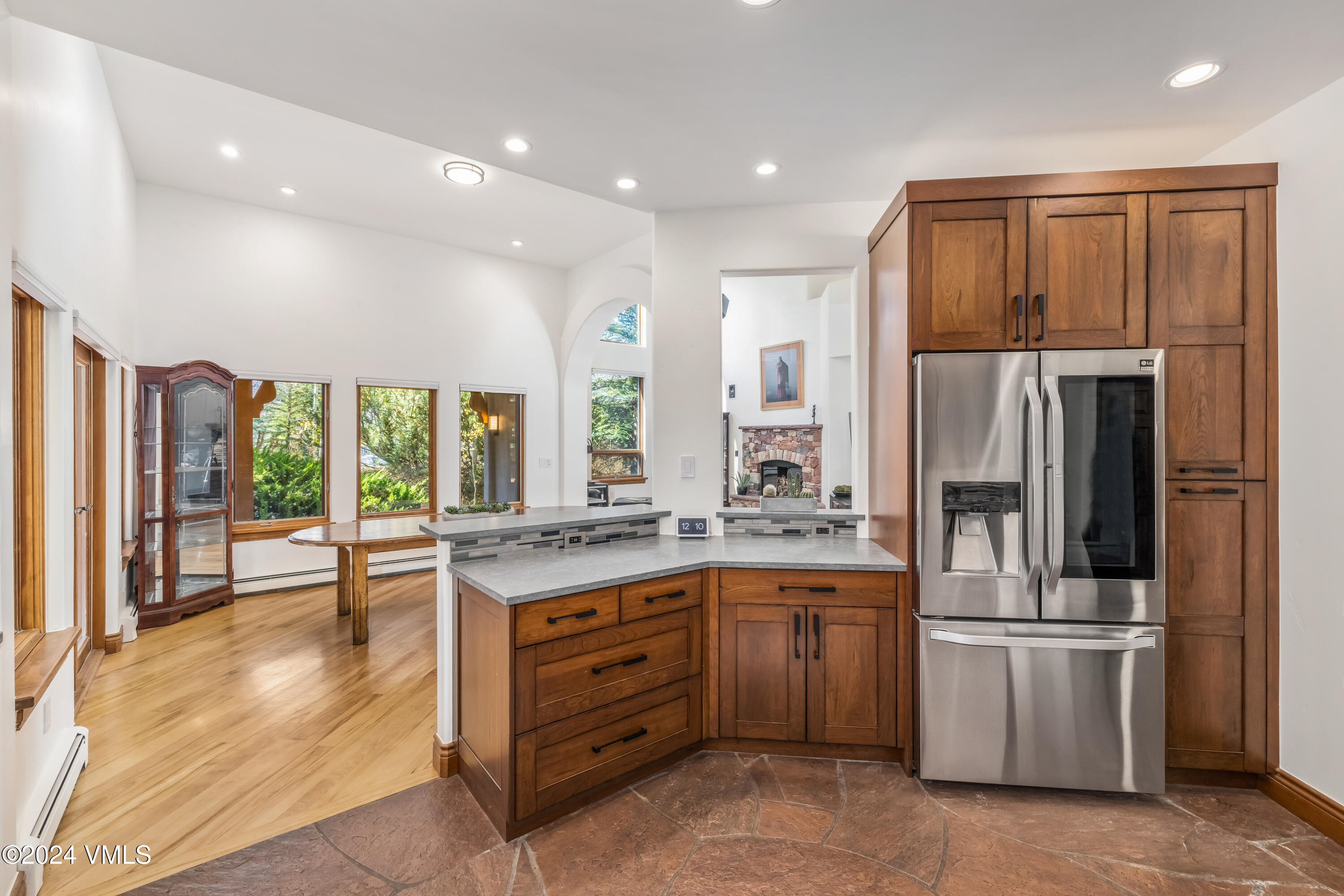 2076 Vermont Road Vail, CO 81657 - Photo 13 of 39 a kitchen with stainless steel appliances granite countertop a refrigerator and a stove top oven