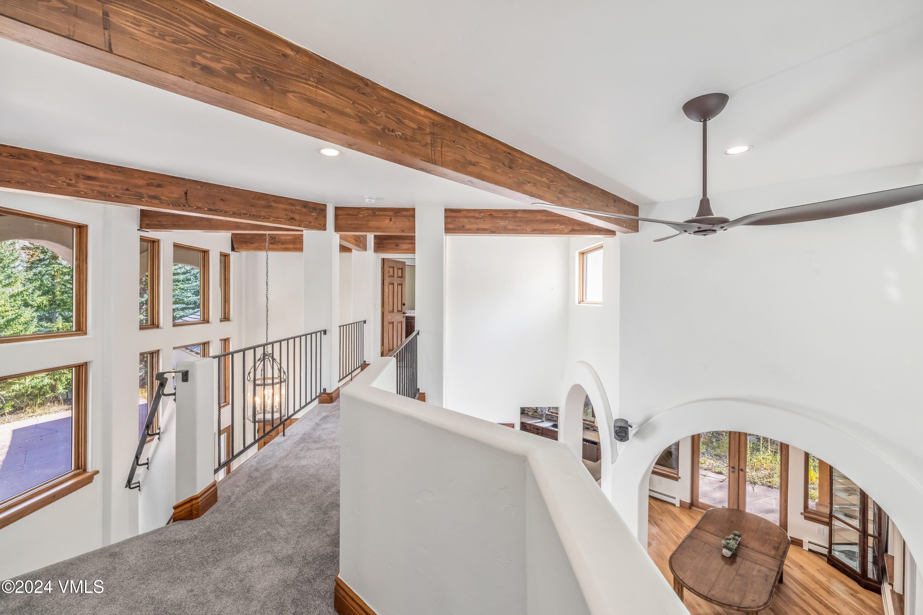 2076 Vermont Road Vail, CO 81657 - Photo 15 of 39 a front view of a house with wooden floor