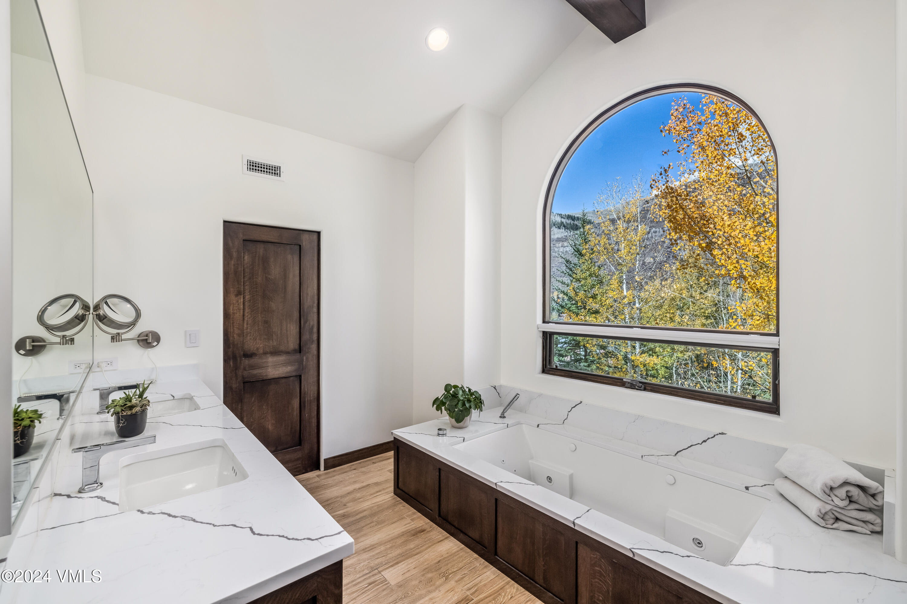 2076 Vermont Road Vail, CO 81657 - Photo 17 of 39 a view of bathroom with dual sinks