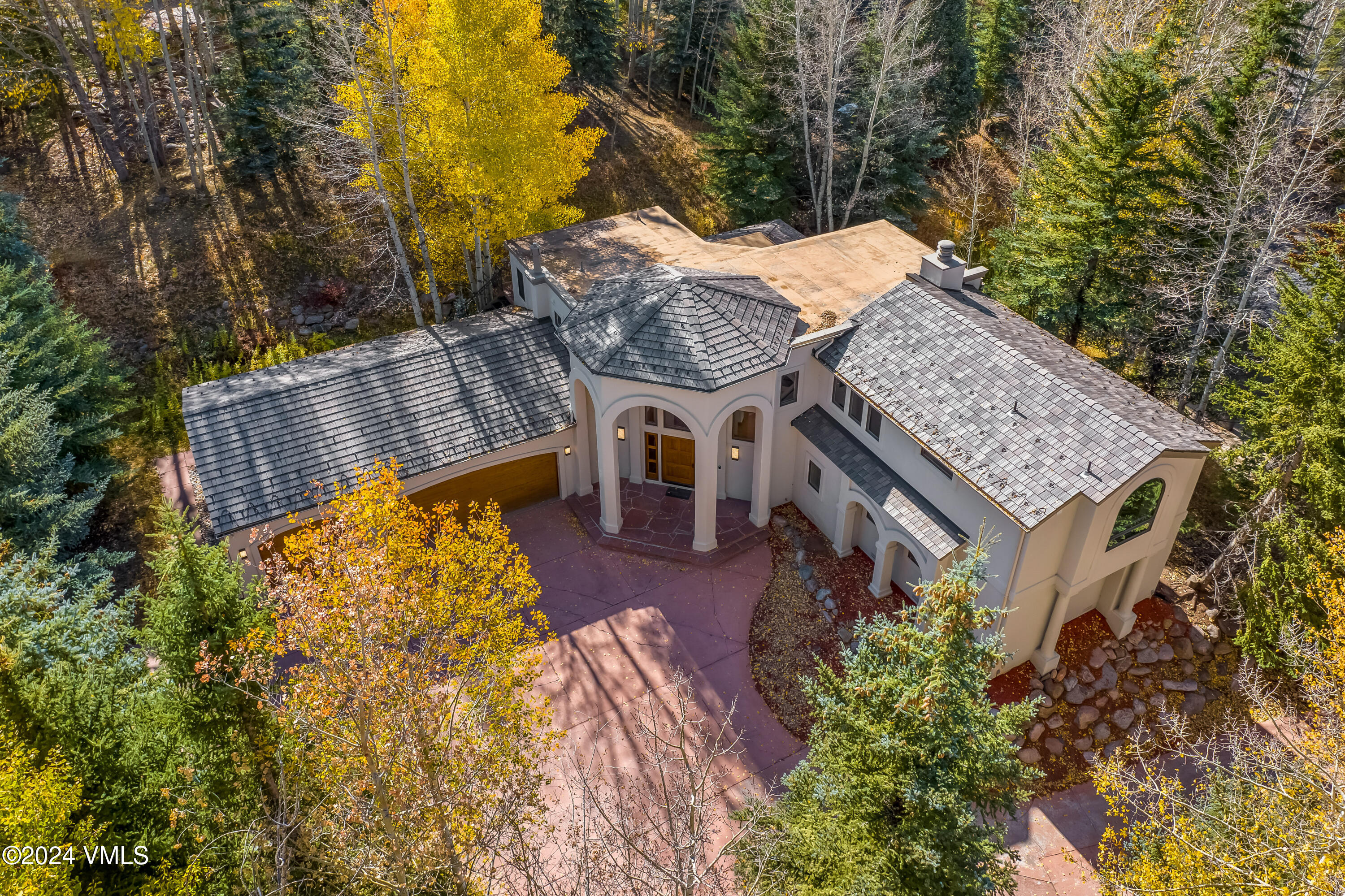 2076 Vermont Road Vail, CO 81657 - Photo 22 of 39 aerial view of a house with a yard