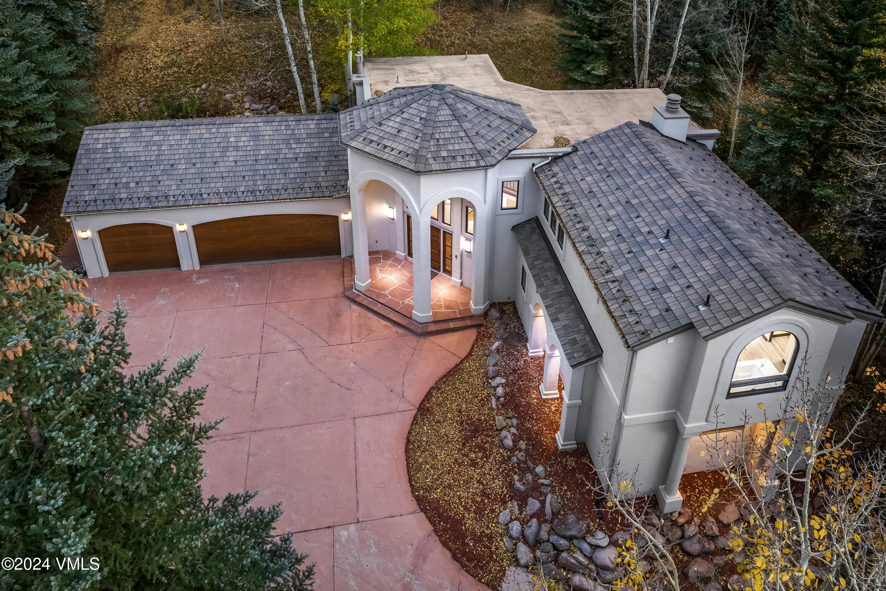 2076 Vermont Road Vail, CO 81657 - Photo 3 of 39 an aerial view of a house with a yard