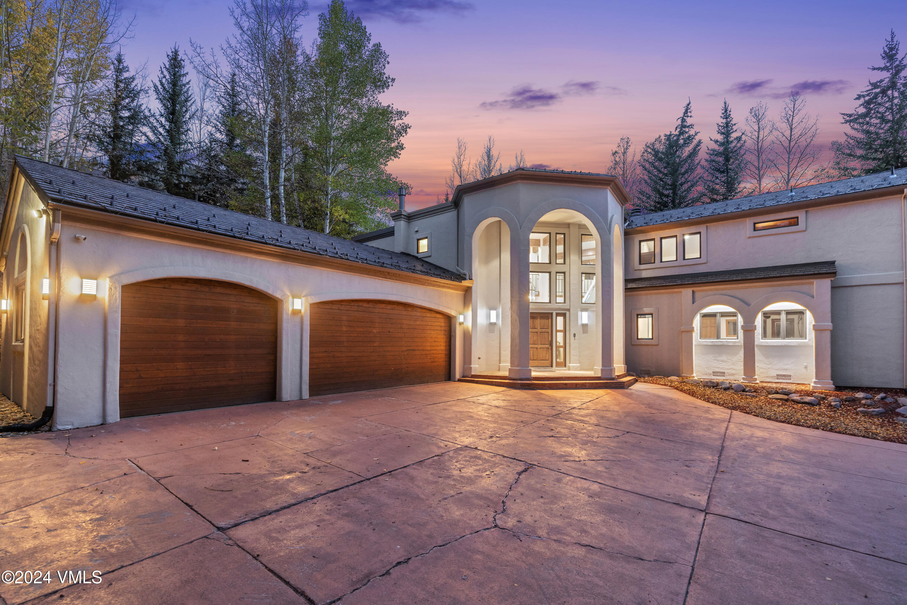 2076 Vermont Road Vail, CO 81657 - Photo 34 of 39 a large house with a outdoor space