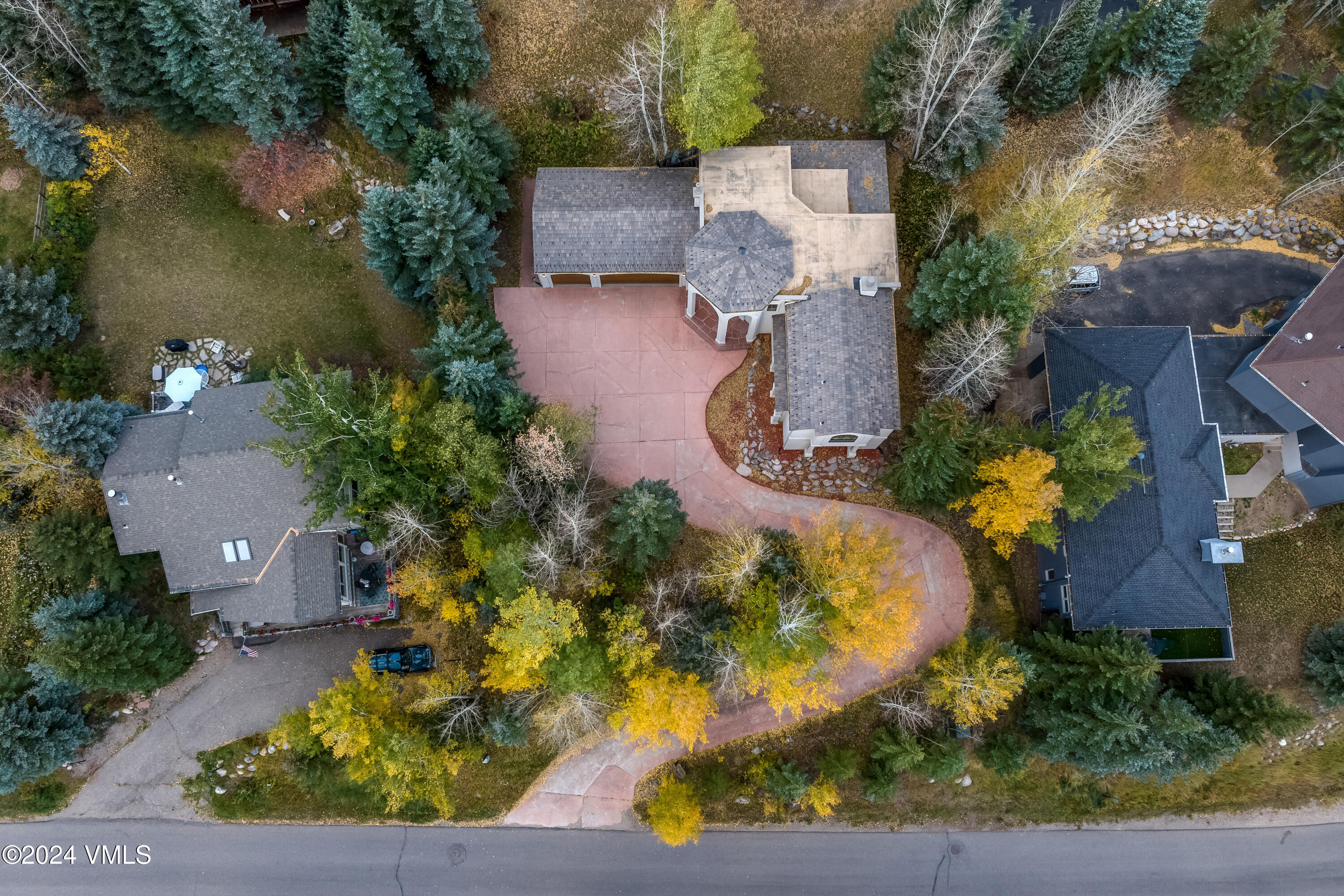 2076 Vermont Road Vail, CO 81657 - Photo 36 of 39 an aerial view of a house with a yard and a fountain