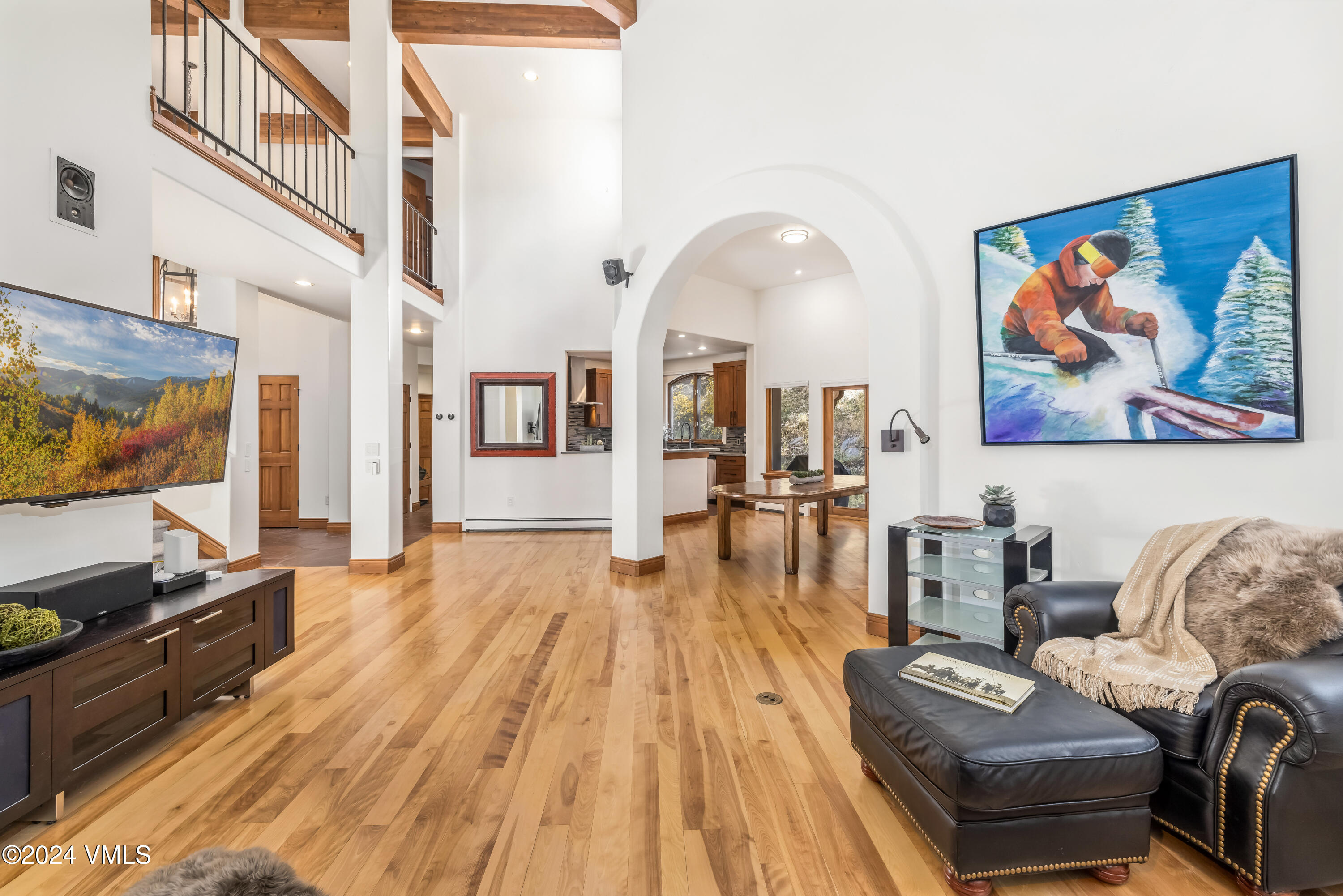 2076 Vermont Road Vail, CO 81657 - Photo 9 of 39 a living room with furniture and a flat screen tv