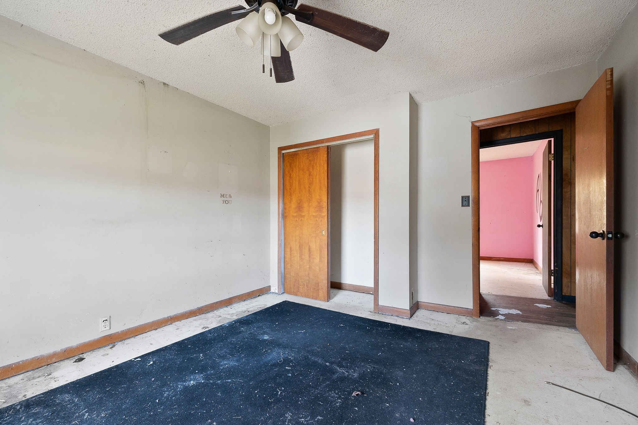 2385 Midway Road Smithville, TN 37166 - Photo 15 of 22 an empty room with closet and a chandelier fan
