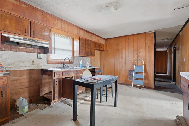 a workspace with furniture and a window