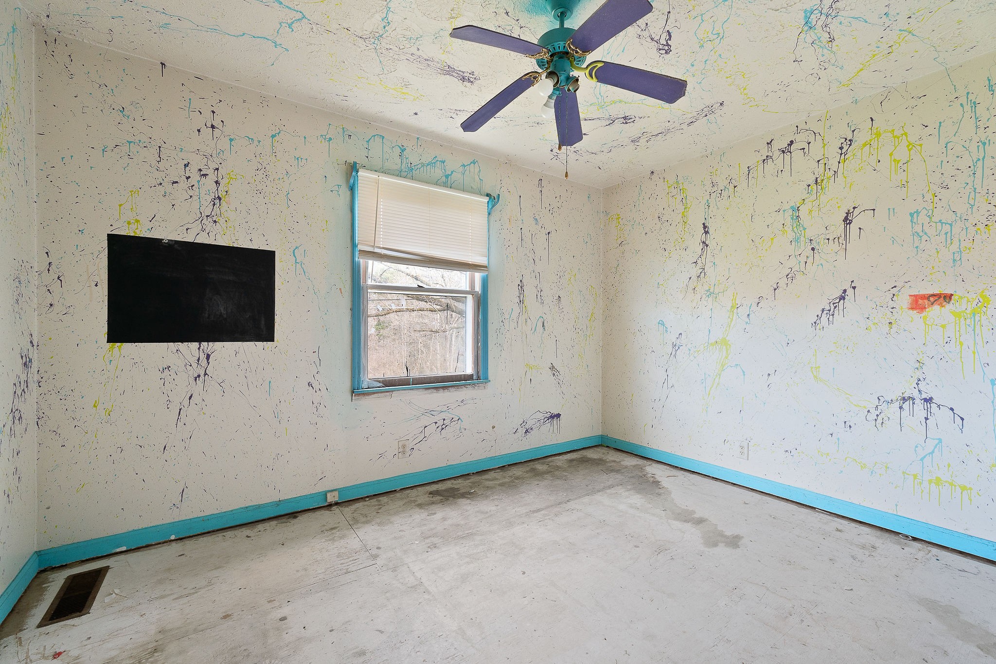 2385 Midway Road Smithville, TN 37166 - Photo 7 of 22 a view of an empty room with a window and a flat screen tv