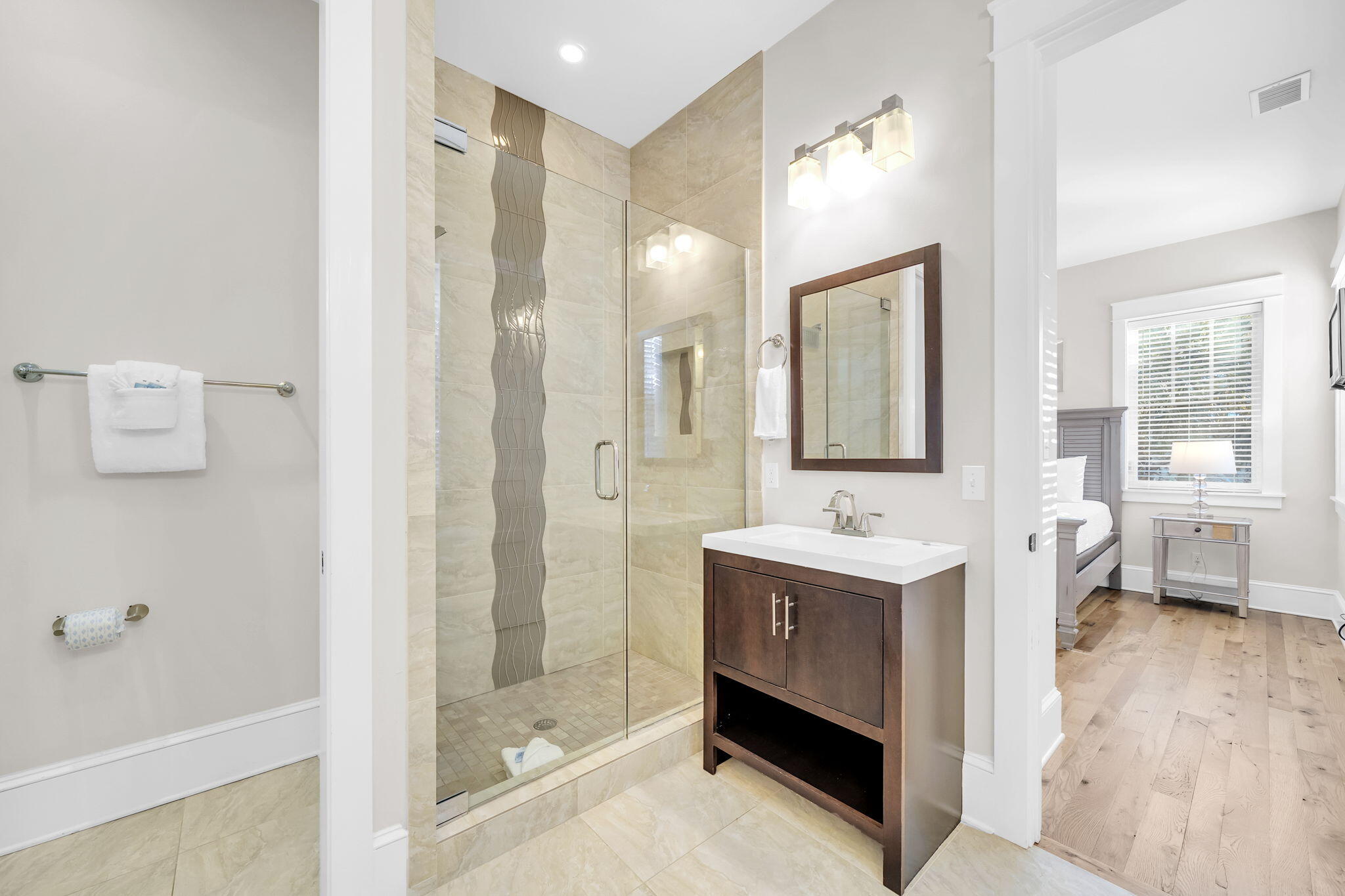 13 Eastern Lake Court Santa Rosa Beach, FL 32459 - Photo 40 of 58 a bathroom with a sink and a mirror