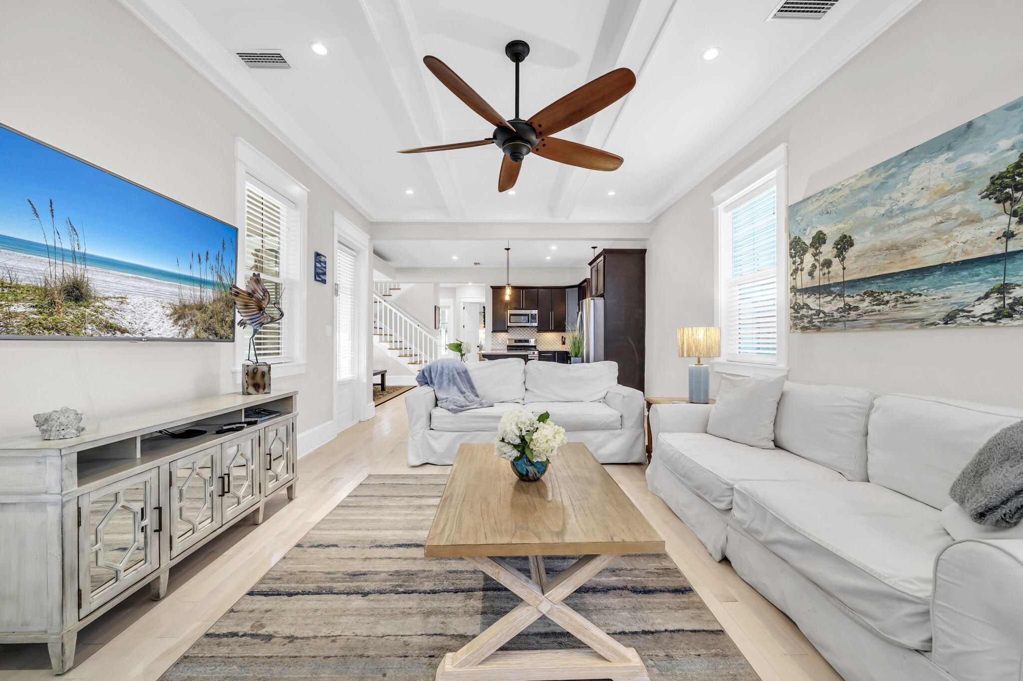 13 Eastern Lake Court Santa Rosa Beach, FL 32459 - Photo 8 of 58 a living room with furniture a ceiling fan and a rug