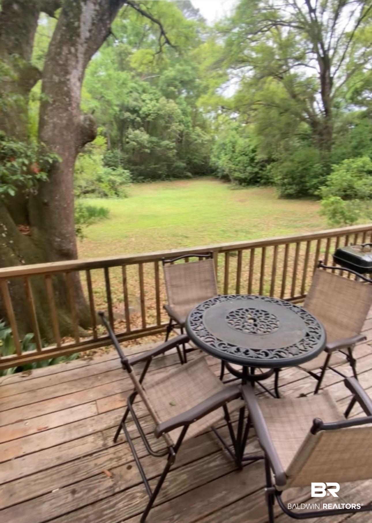 1302 Oak Street Daphne, AL 36526 - Photo 23 of 34 Wooden terrace featuring a yard