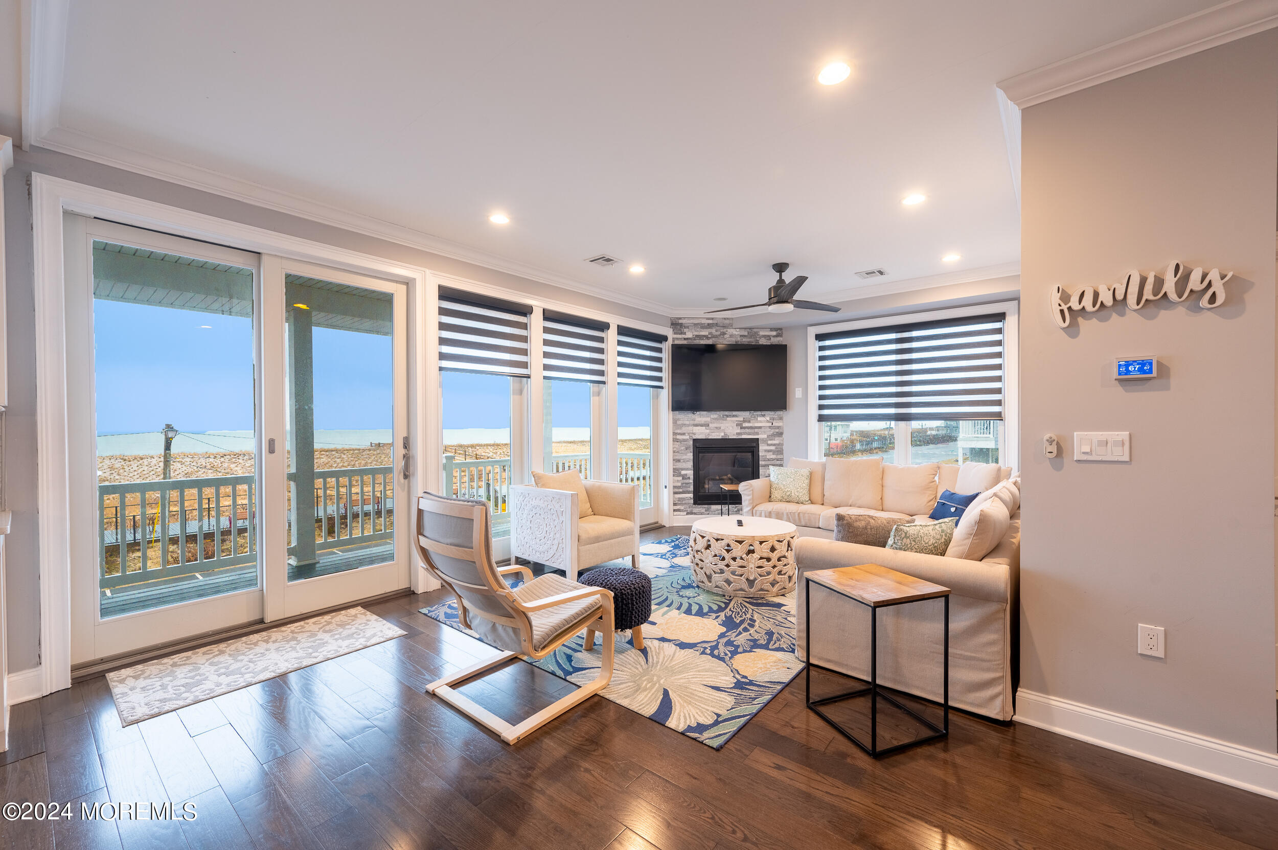 1851 Oceanfront Seaside Heights, NJ 08751 - Photo 29 of 66 a living room with furniture and a large window