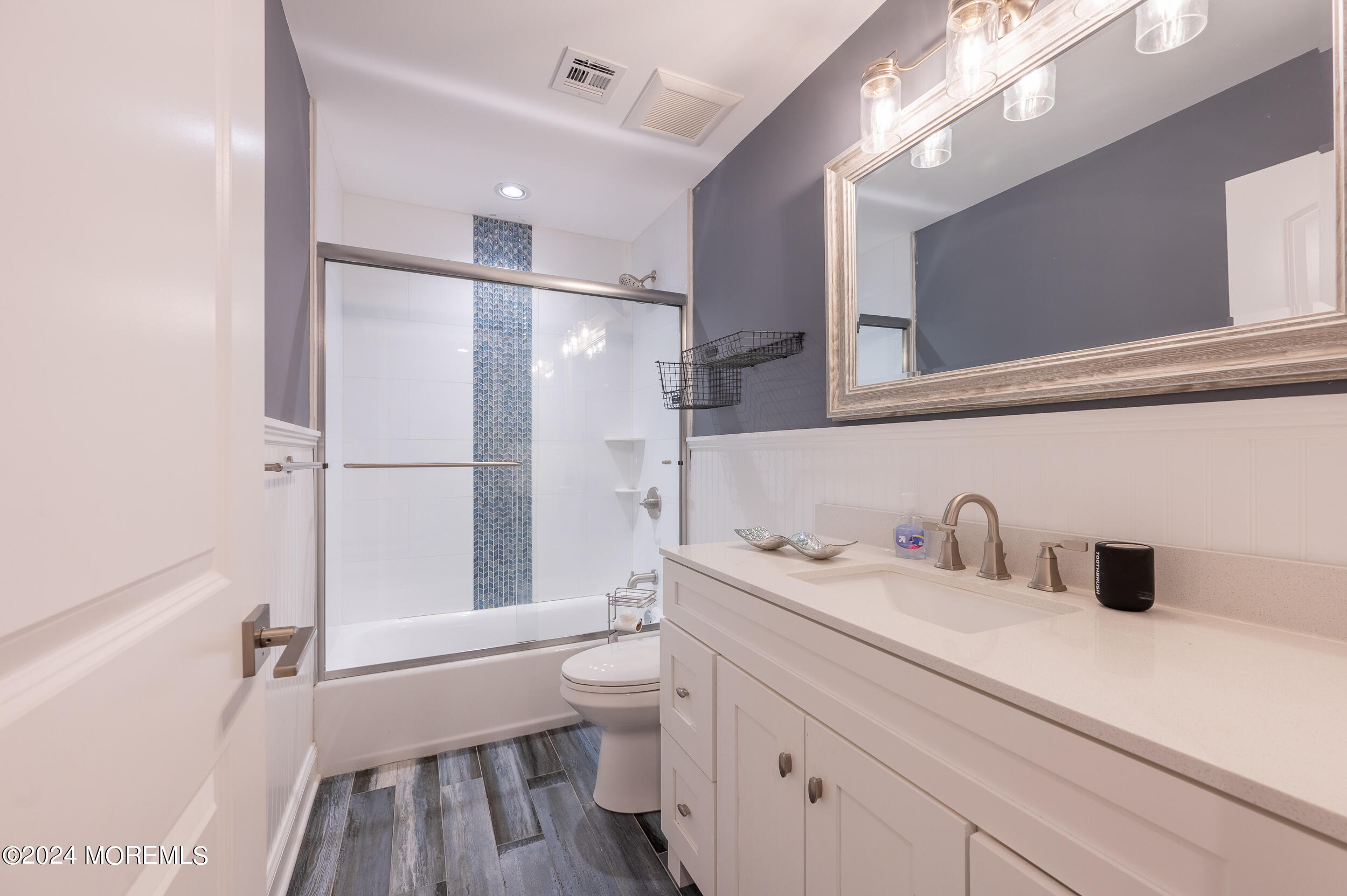 1851 Oceanfront Seaside Heights, NJ 08751 - Photo 31 of 66 a bathroom with a sink and a mirror