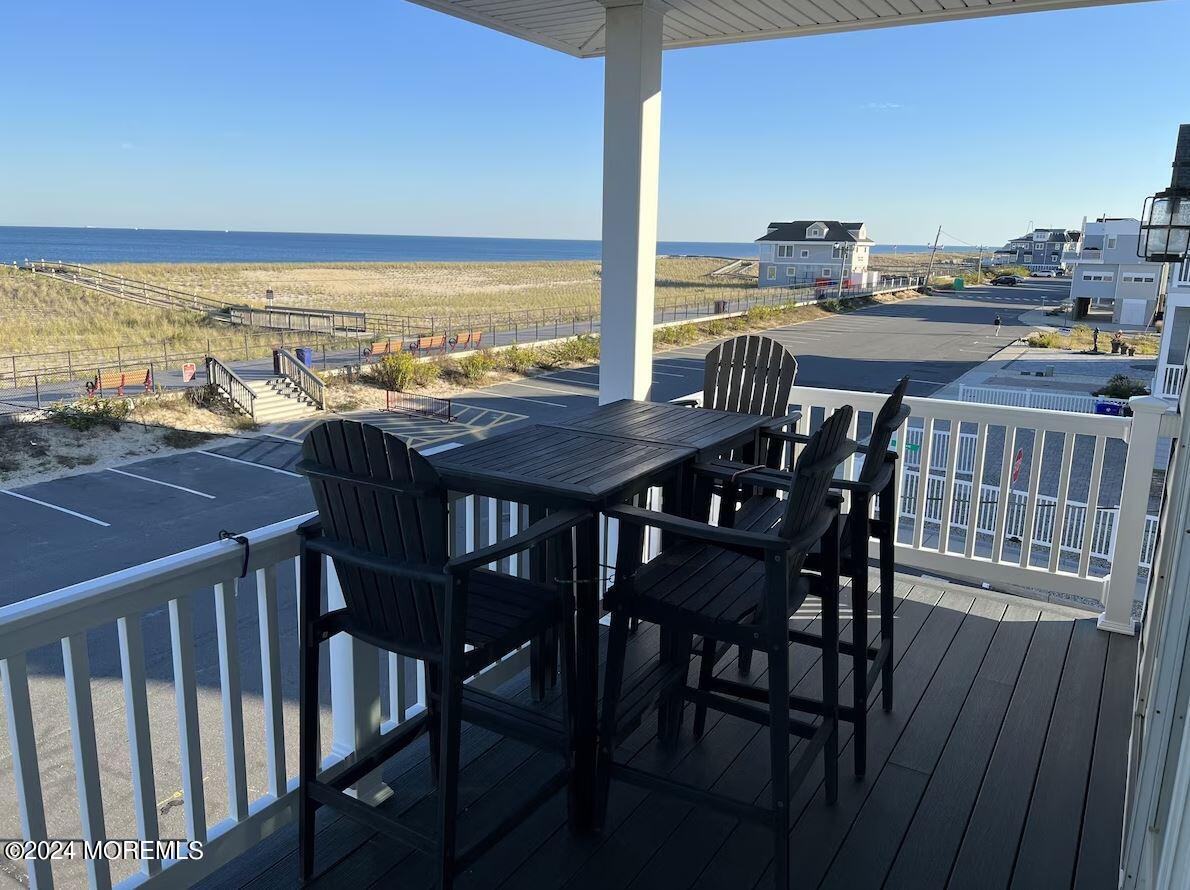 1851 Oceanfront Seaside Heights, NJ 08751 - Photo 32 of 66 a view of a balcony dining space and ocean view